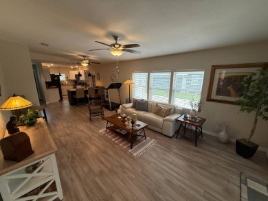 This beautifully updated stucco home is located only steps to on Del Tura Golf and Country Club in Florida - for sale on GolfHomes.com, golf home, golf lot
