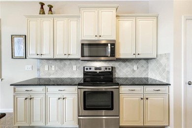 LUXURY LIVING with Sunset Golf Course Views in The Quarry! on The Golf Lodge At the Quarry in Florida - for sale on GolfHomes.com, golf home, golf lot