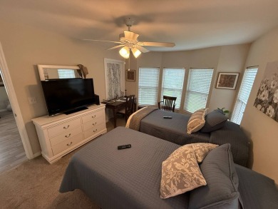 This beautifully updated stucco home is located only steps to on Del Tura Golf and Country Club in Florida - for sale on GolfHomes.com, golf home, golf lot