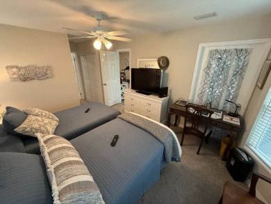 This beautifully updated stucco home is located only steps to on Del Tura Golf and Country Club in Florida - for sale on GolfHomes.com, golf home, golf lot
