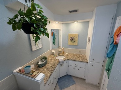 This beautifully updated stucco home is located only steps to on Del Tura Golf and Country Club in Florida - for sale on GolfHomes.com, golf home, golf lot