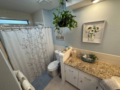 This beautifully updated stucco home is located only steps to on Del Tura Golf and Country Club in Florida - for sale on GolfHomes.com, golf home, golf lot