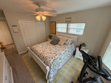 This beautifully updated stucco home is located only steps to on Del Tura Golf and Country Club in Florida - for sale on GolfHomes.com, golf home, golf lot