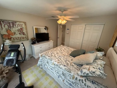 This beautifully updated stucco home is located only steps to on Del Tura Golf and Country Club in Florida - for sale on GolfHomes.com, golf home, golf lot