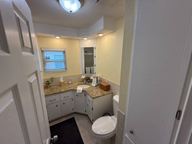 This beautifully updated stucco home is located only steps to on Del Tura Golf and Country Club in Florida - for sale on GolfHomes.com, golf home, golf lot