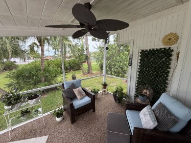 This beautifully updated stucco home is located only steps to on Del Tura Golf and Country Club in Florida - for sale on GolfHomes.com, golf home, golf lot