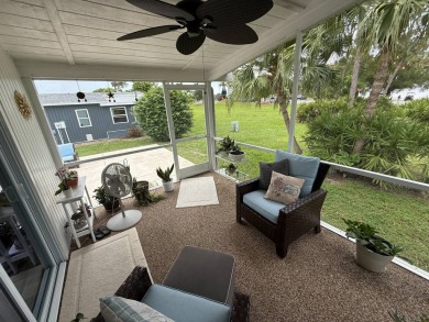 This beautifully updated stucco home is located only steps to on Del Tura Golf and Country Club in Florida - for sale on GolfHomes.com, golf home, golf lot