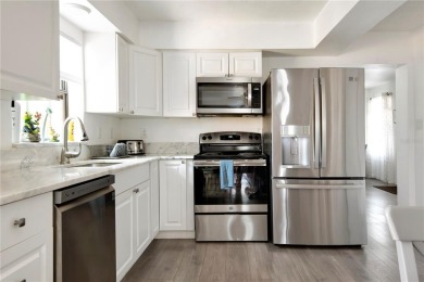 Turnkey Vacation Rental Duplex in Largo! Welcome to your next on Pinecrest Golf Club in Florida - for sale on GolfHomes.com, golf home, golf lot