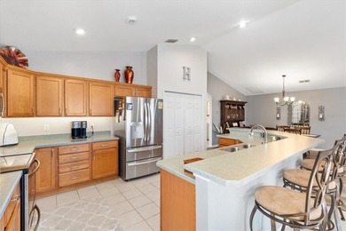 Tucked inside the sought-after 55+ Gated Golf Community of on Stonecrest Golf and Club Club in Florida - for sale on GolfHomes.com, golf home, golf lot