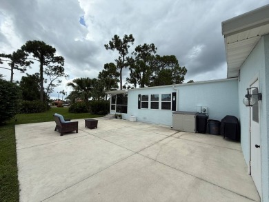 This beautifully updated stucco home is located only steps to on Del Tura Golf and Country Club in Florida - for sale on GolfHomes.com, golf home, golf lot