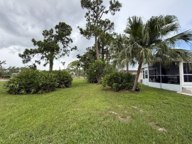This beautifully updated stucco home is located only steps to on Del Tura Golf and Country Club in Florida - for sale on GolfHomes.com, golf home, golf lot