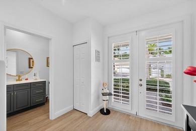 Nestled in the charming community of Larkspur Landing, an on Ibis Golf and Country Club in Florida - for sale on GolfHomes.com, golf home, golf lot