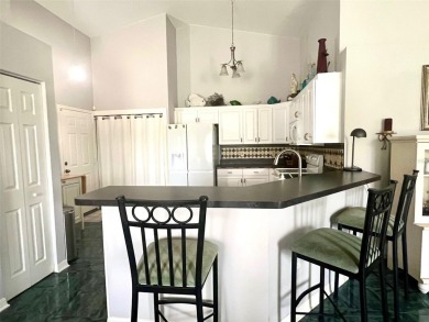 METICULOUSLY MAINTAINED 2 BEDROOM VILLA. END UNIT IN A PREMIER on Terra Ceia Golf and Country Club in Florida - for sale on GolfHomes.com, golf home, golf lot