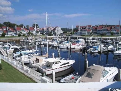 Deeded boat slip in charming Mariner's Pointe in Little River on The Valley At Eastport in South Carolina - for sale on GolfHomes.com, golf home, golf lot