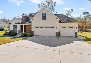 Welcome to this exceptional lakefront residence in the exclusive on The Links At Stoney Point in South Carolina - for sale on GolfHomes.com, golf home, golf lot