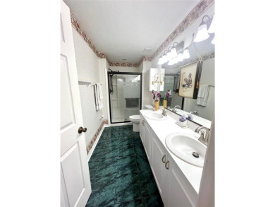 METICULOUSLY MAINTAINED 2 BEDROOM VILLA. END UNIT IN A PREMIER on Terra Ceia Golf and Country Club in Florida - for sale on GolfHomes.com, golf home, golf lot