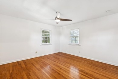 Nestled on a lush 82-ft wide lot beneath the canopy of heritage on Stevens Park Golf Course in Texas - for sale on GolfHomes.com, golf home, golf lot