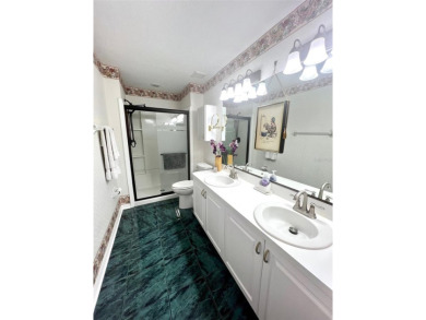 METICULOUSLY MAINTAINED 2 BEDROOM VILLA. END UNIT IN A PREMIER on Terra Ceia Golf and Country Club in Florida - for sale on GolfHomes.com, golf home, golf lot