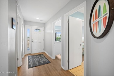 Welcome to 137 Ocean Point Drive - a charming 2-bedroom, 2-bath on Ocean Point Golf Links in South Carolina - for sale on GolfHomes.com, golf home, golf lot