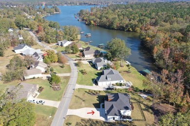 Welcome to this exceptional lakefront residence in the exclusive on The Links At Stoney Point in South Carolina - for sale on GolfHomes.com, golf home, golf lot