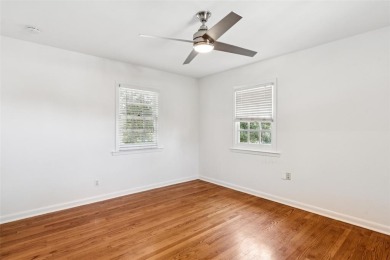 Nestled on a lush 82-ft wide lot beneath the canopy of heritage on Stevens Park Golf Course in Texas - for sale on GolfHomes.com, golf home, golf lot