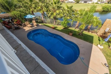 Experience luxury living with this exquisite 4-bedroom, 2.5-bath on South Padre Island Golf Club in Texas - for sale on GolfHomes.com, golf home, golf lot