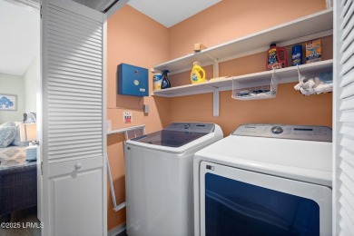 Welcome to 137 Ocean Point Drive - a charming 2-bedroom, 2-bath on Ocean Point Golf Links in South Carolina - for sale on GolfHomes.com, golf home, golf lot