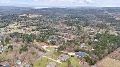 Discover the perfect blend of comfort and style in this on Russellville Country Club in Arkansas - for sale on GolfHomes.com, golf home, golf lot