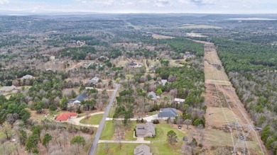 Discover the perfect blend of comfort and style in this on Russellville Country Club in Arkansas - for sale on GolfHomes.com, golf home, golf lot