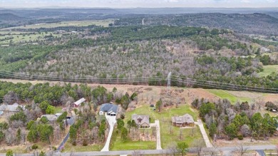 Discover the perfect blend of comfort and style in this on Russellville Country Club in Arkansas - for sale on GolfHomes.com, golf home, golf lot