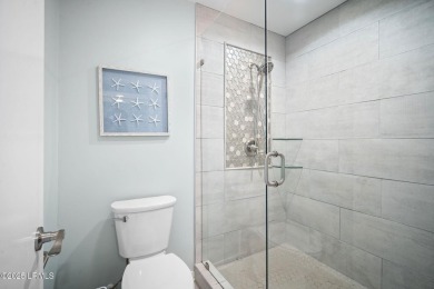 Welcome to 137 Ocean Point Drive - a charming 2-bedroom, 2-bath on Ocean Point Golf Links in South Carolina - for sale on GolfHomes.com, golf home, golf lot