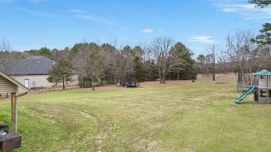 Discover the perfect blend of comfort and style in this on Russellville Country Club in Arkansas - for sale on GolfHomes.com, golf home, golf lot