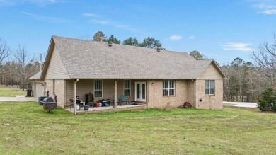 Discover the perfect blend of comfort and style in this on Russellville Country Club in Arkansas - for sale on GolfHomes.com, golf home, golf lot