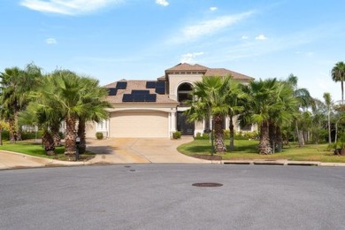 Experience luxury living with this exquisite 4-bedroom, 2.5-bath on South Padre Island Golf Club in Texas - for sale on GolfHomes.com, golf home, golf lot