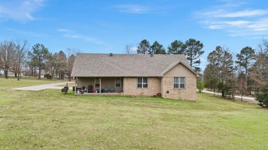 Discover the perfect blend of comfort and style in this on Russellville Country Club in Arkansas - for sale on GolfHomes.com, golf home, golf lot