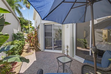 Nestled in the charming community of Larkspur Landing, an on Ibis Golf and Country Club in Florida - for sale on GolfHomes.com, golf home, golf lot