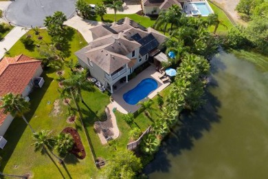 Experience luxury living with this exquisite 4-bedroom, 2.5-bath on South Padre Island Golf Club in Texas - for sale on GolfHomes.com, golf home, golf lot