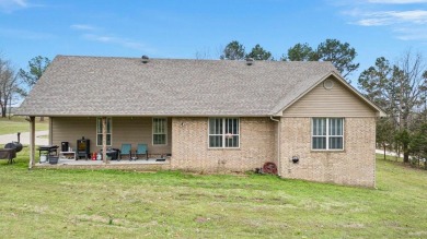 Discover the perfect blend of comfort and style in this on Russellville Country Club in Arkansas - for sale on GolfHomes.com, golf home, golf lot