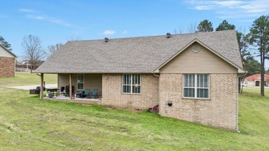 Discover the perfect blend of comfort and style in this on Russellville Country Club in Arkansas - for sale on GolfHomes.com, golf home, golf lot