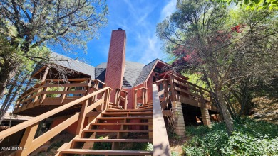 ''Golf course view surrounded by huge trees from every direction on Payson Golf Course in Arizona - for sale on GolfHomes.com, golf home, golf lot