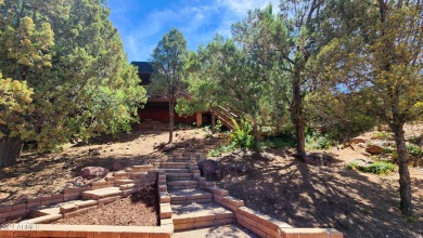 ''Golf course view surrounded by huge trees from every direction on Payson Golf Course in Arizona - for sale on GolfHomes.com, golf home, golf lot