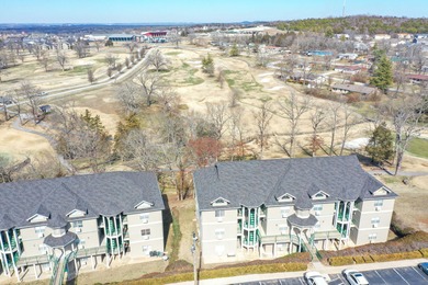 Welcome to this rare 3 bedroom 3 full bath penthouse condominium on Holiday Hills Resort and Golf in Missouri - for sale on GolfHomes.com, golf home, golf lot