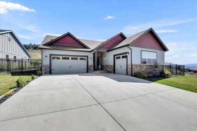 This beautifully designed 3 bed, 2 bath home offers style on Trailhead At Liberty Lake in Washington - for sale on GolfHomes.com, golf home, golf lot