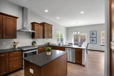 This beautifully designed 3 bed, 2 bath home offers style on Trailhead At Liberty Lake in Washington - for sale on GolfHomes.com, golf home, golf lot