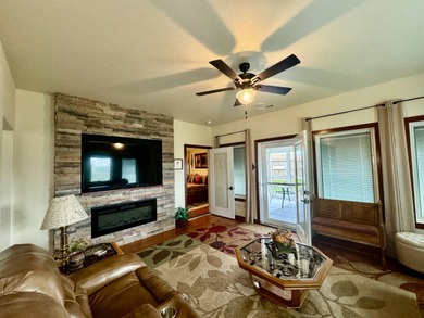 Built in 2021, this three-bedroom, two-bathroom back-lot lake on Roy View Golf Course in South Dakota - for sale on GolfHomes.com, golf home, golf lot