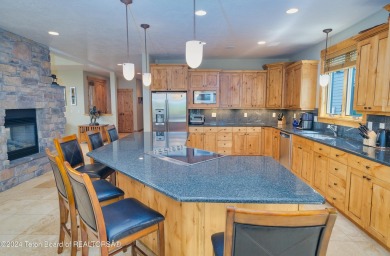 Welcome to this stunning 4 bedroom, 3 and a half bathroom home on Teton Springs Resort and Club in Idaho - for sale on GolfHomes.com, golf home, golf lot