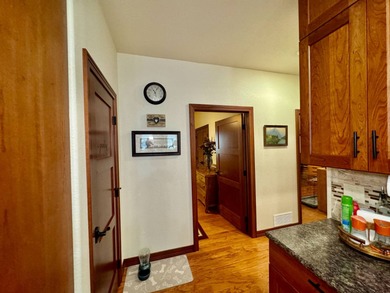 Built in 2021, this three-bedroom, two-bathroom back-lot lake on Roy View Golf Course in South Dakota - for sale on GolfHomes.com, golf home, golf lot