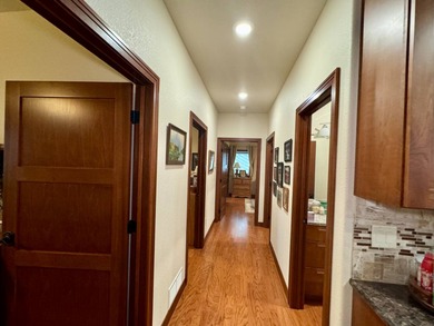 Built in 2021, this three-bedroom, two-bathroom back-lot lake on Roy View Golf Course in South Dakota - for sale on GolfHomes.com, golf home, golf lot