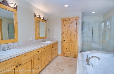 Welcome to this stunning 4 bedroom, 3 and a half bathroom home on Teton Springs Resort and Club in Idaho - for sale on GolfHomes.com, golf home, golf lot