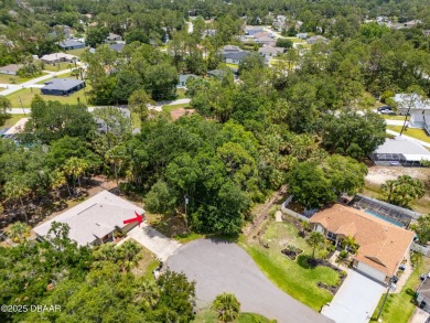 Tucked away at the end of a quiet cul-de-sac, this oversized on The Grand Club - Pine Lakes Course in Florida - for sale on GolfHomes.com, golf home, golf lot